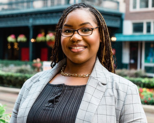 Professional headshot of Dominique, representing the team at Urban Office LLC